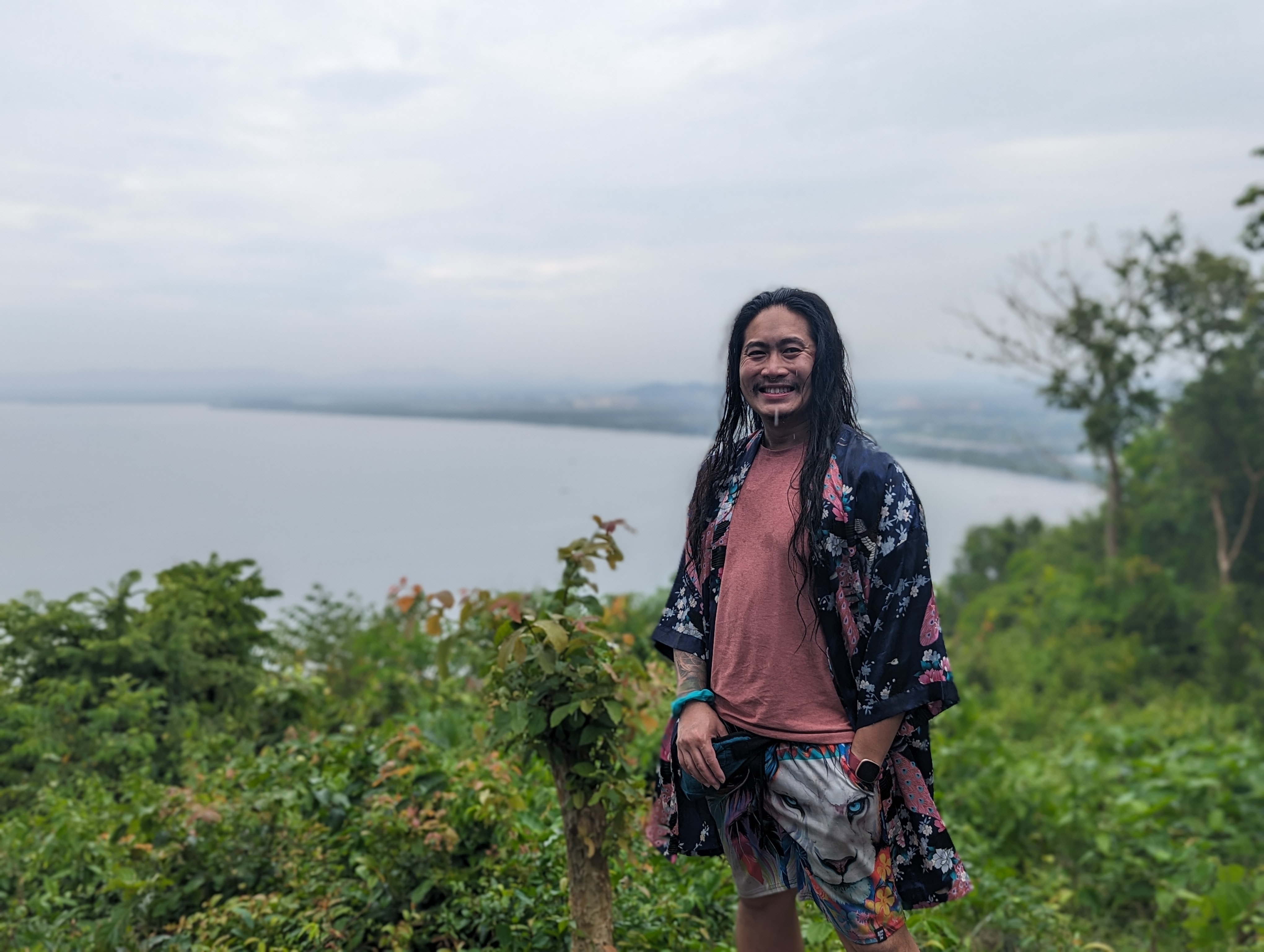 Harry on a hillside above the coast
