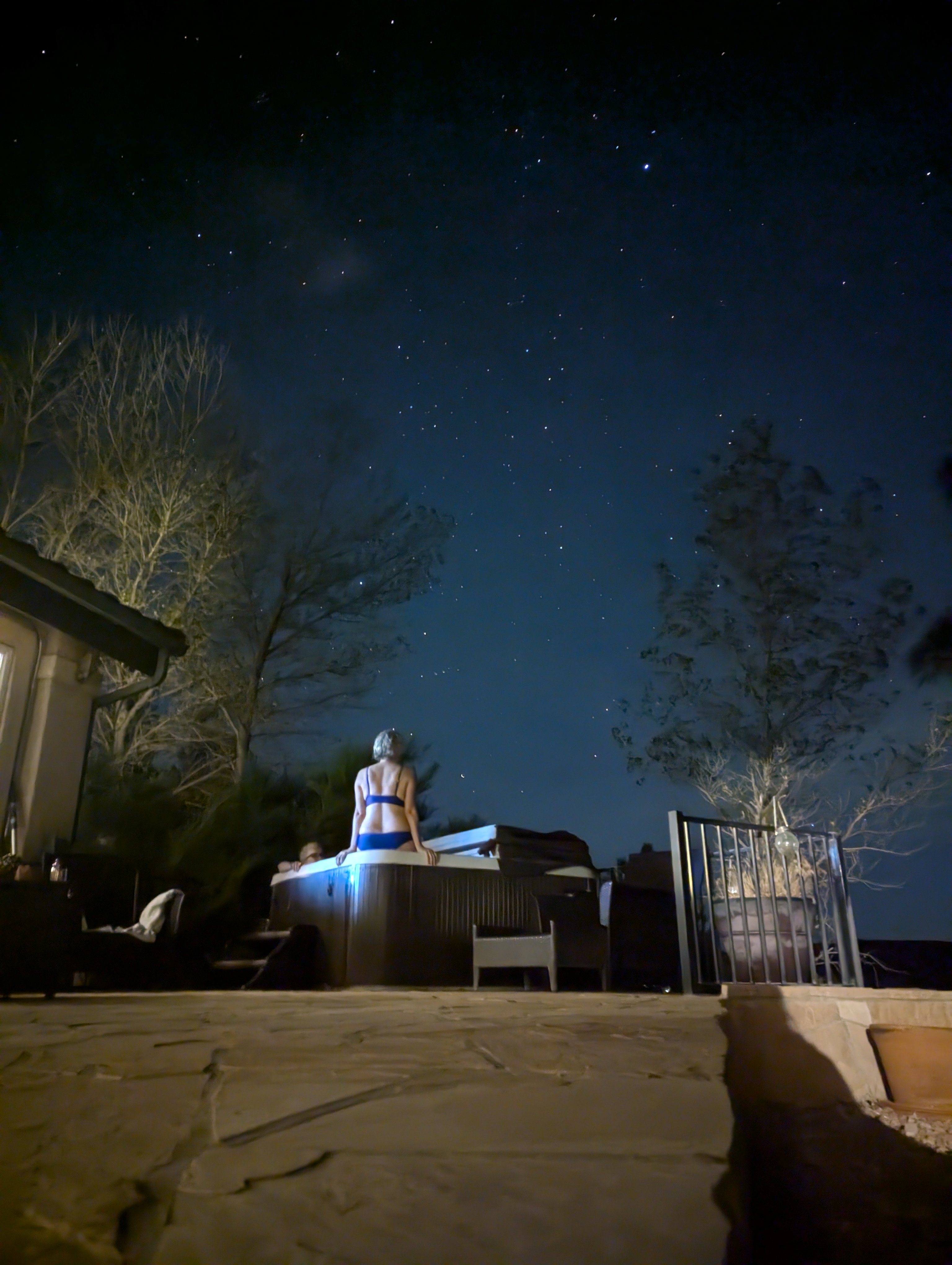 Soaking under a night sky full of stars