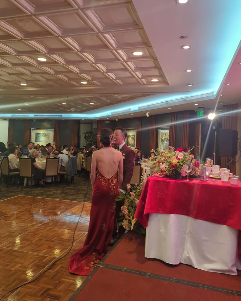 Wedding reception, the couple at the head table