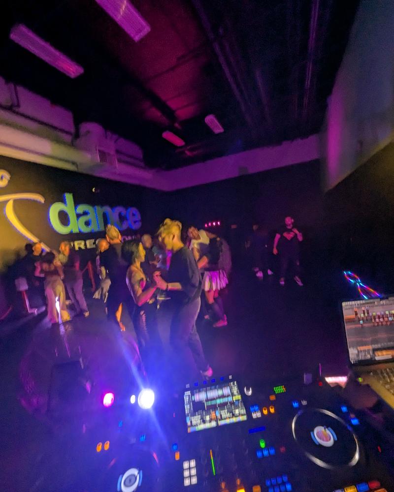 Club dance floor seen from the booth