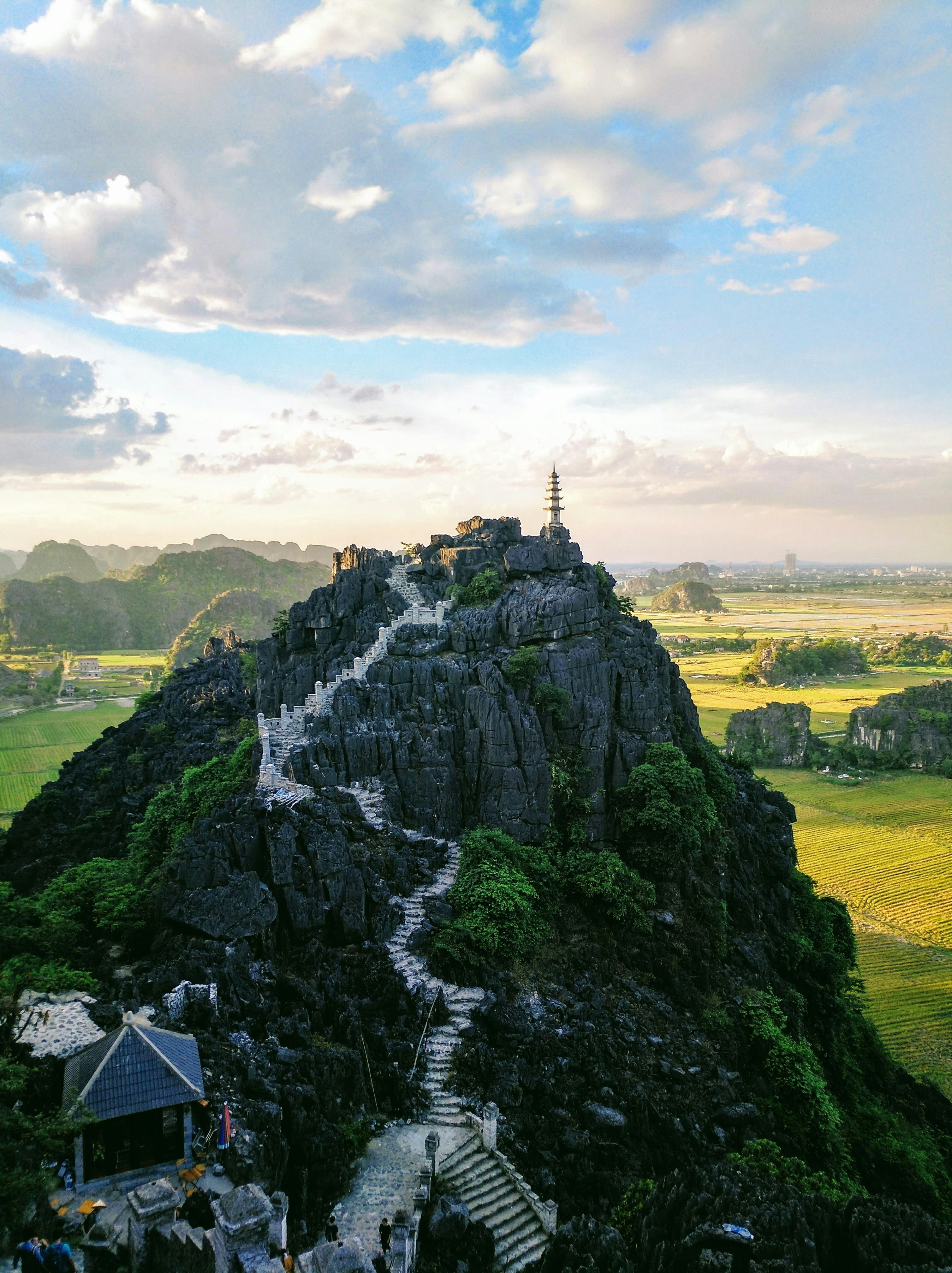 The Hang Múa summit pagoda above the Ninh Bình rice fields