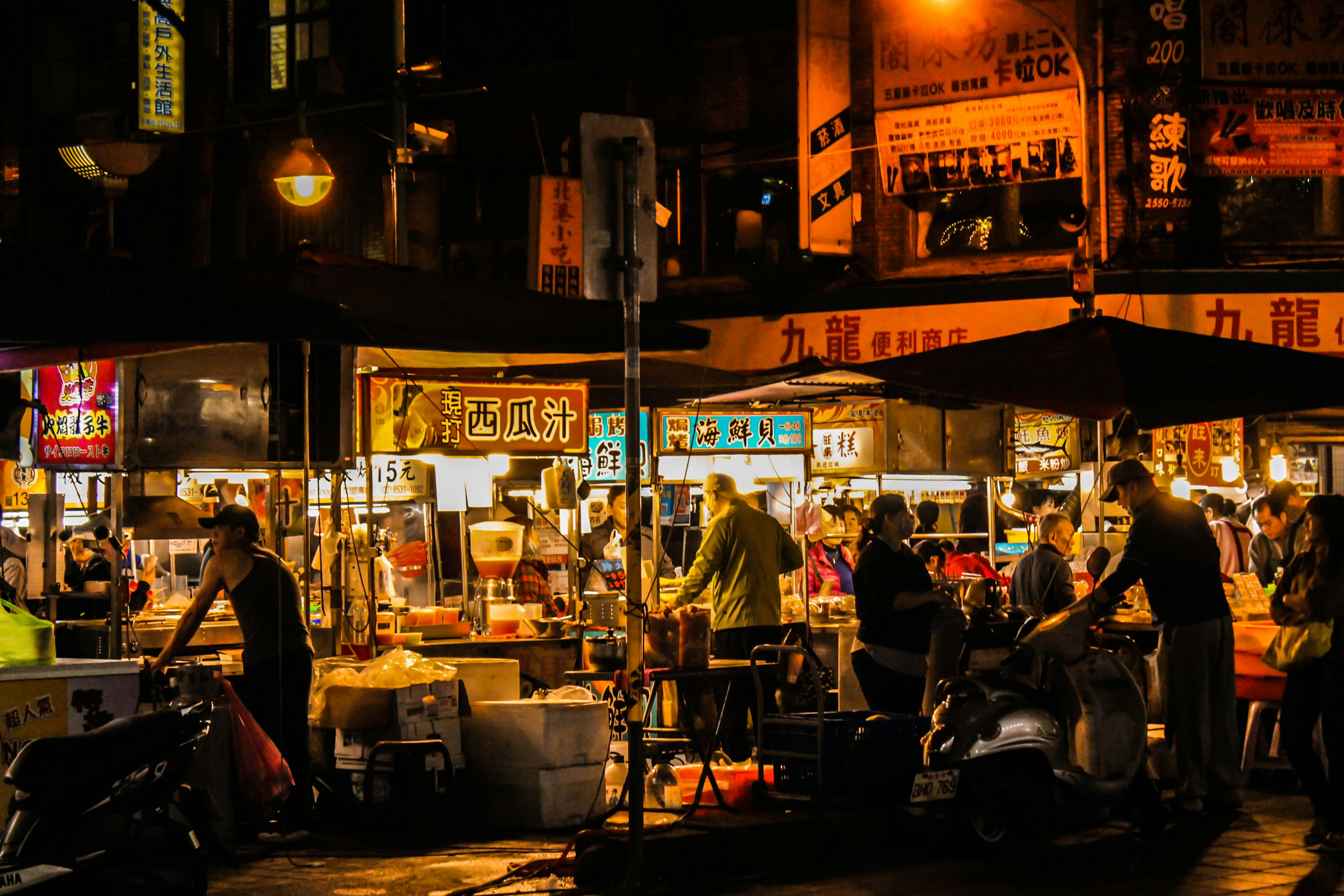 Food stalls and signage at a night market
