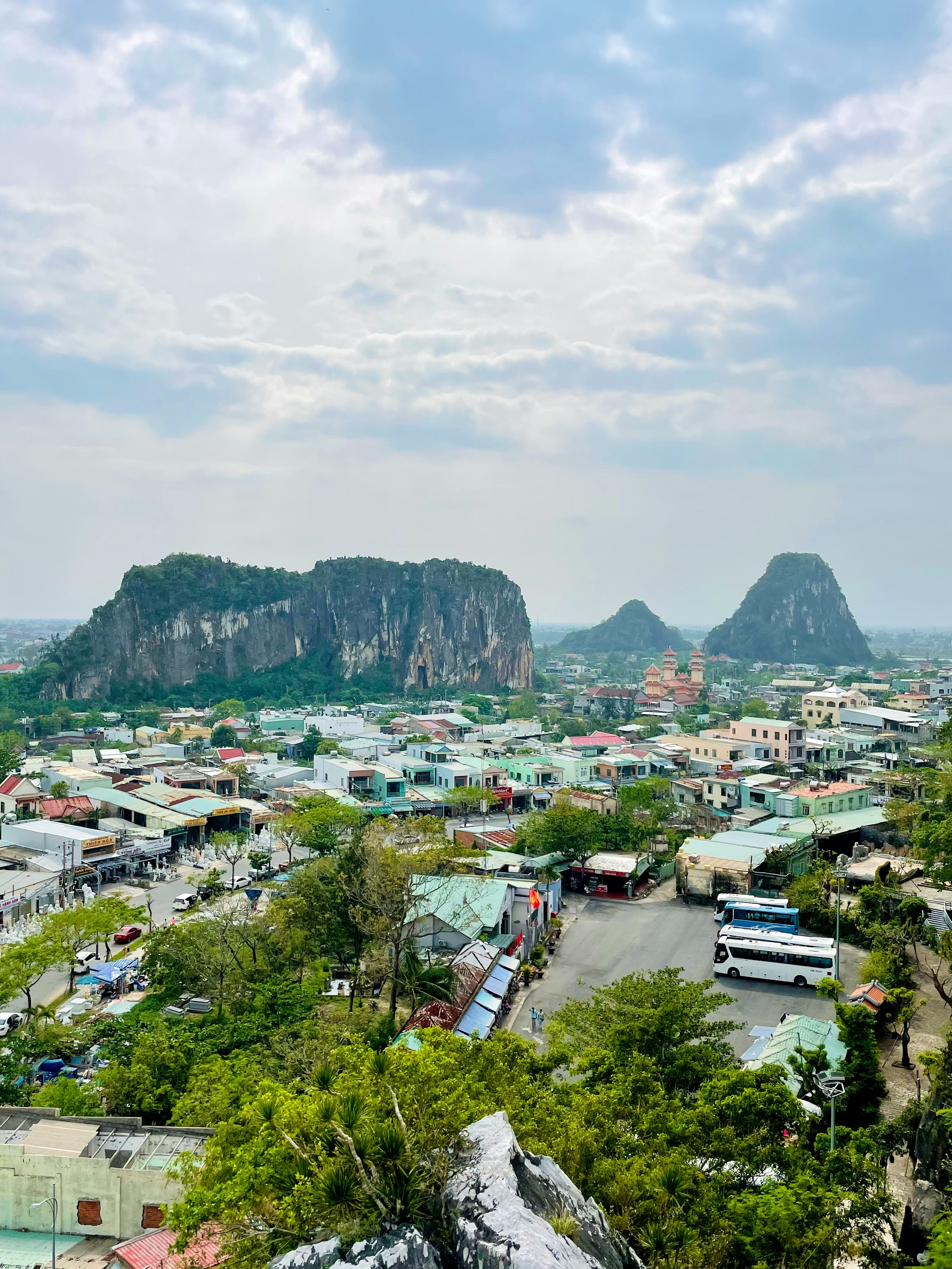 Marble Mountains rising over the town below